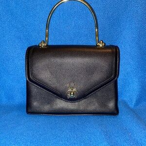 Sondra Roberts Squared black handbag with silver hardware like new